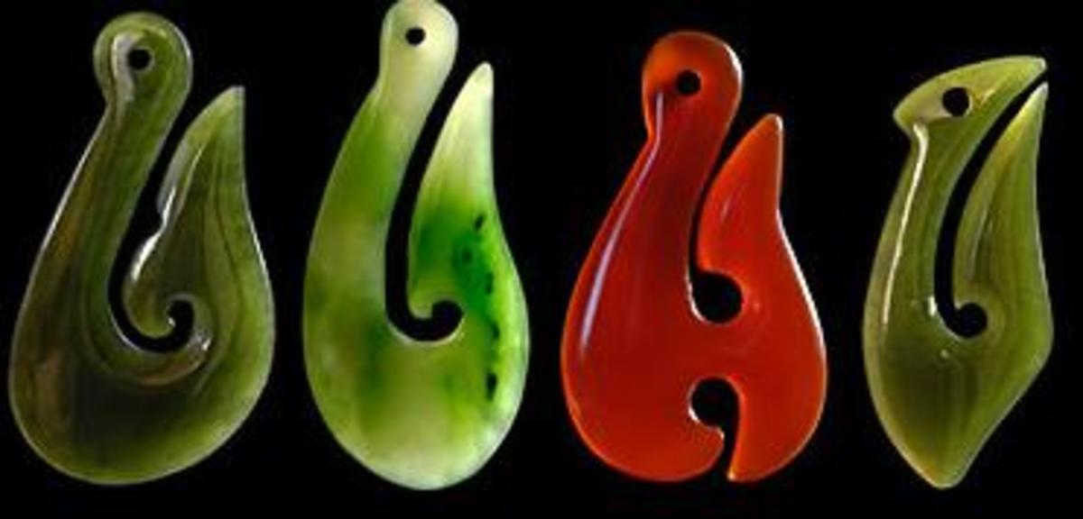 3 pounamu (jade)and 1 red agate Maori fish hook.