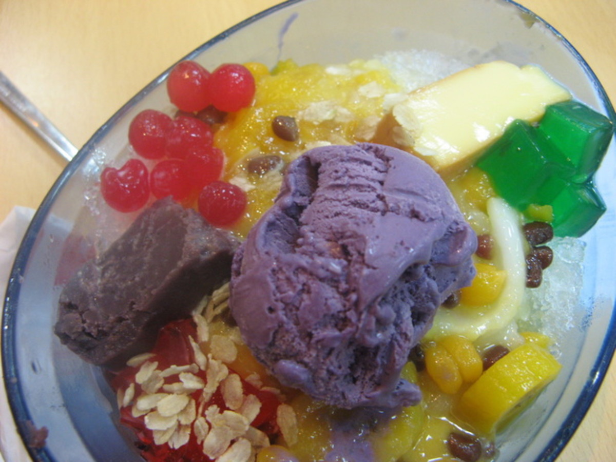 halo halo mixed fruits cooked ice and sweet condensed milk with crushed ice topped with ice cream