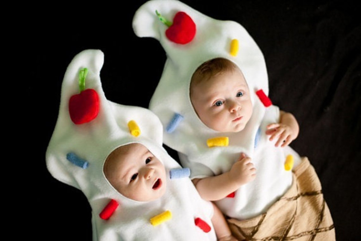 two babies dressed in ice cream cone costumes