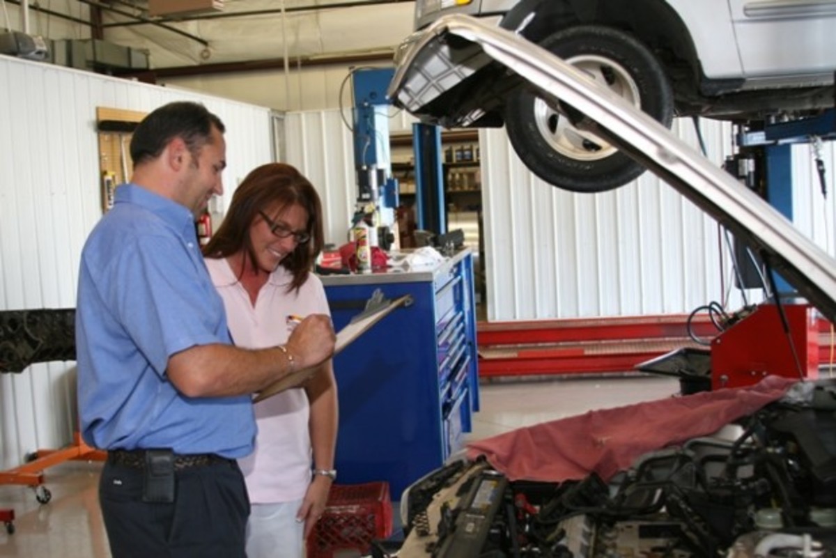 A Good Example Photo of a Good Shop taking time to go over things with the Customer. Image found @ http://national.citysearch.com/profile/4048072/fort_wayne_in/russ_moore_transmission.html?publisher=3040255201