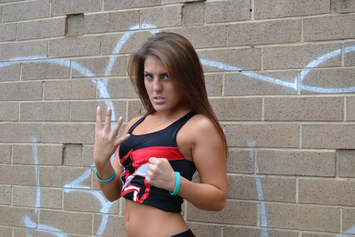 Tessa Blanchard is often seen making the hand sign of The Four Horseman, an iconic faction in wrestling of which her father Tully Blanchard was a founding member. Tessa is proud of her legacy and lives up to it.