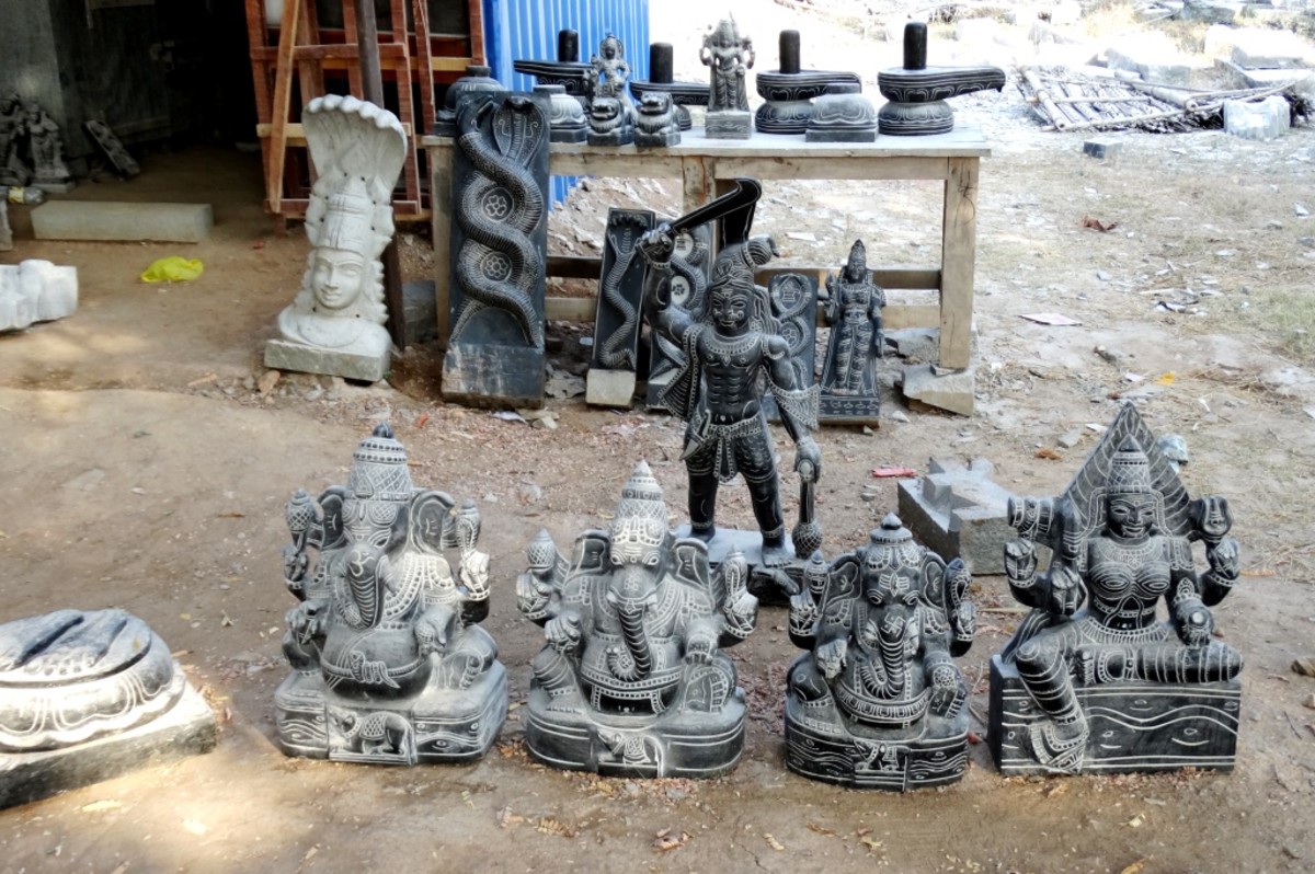 Stone idols for sale at one point of the path