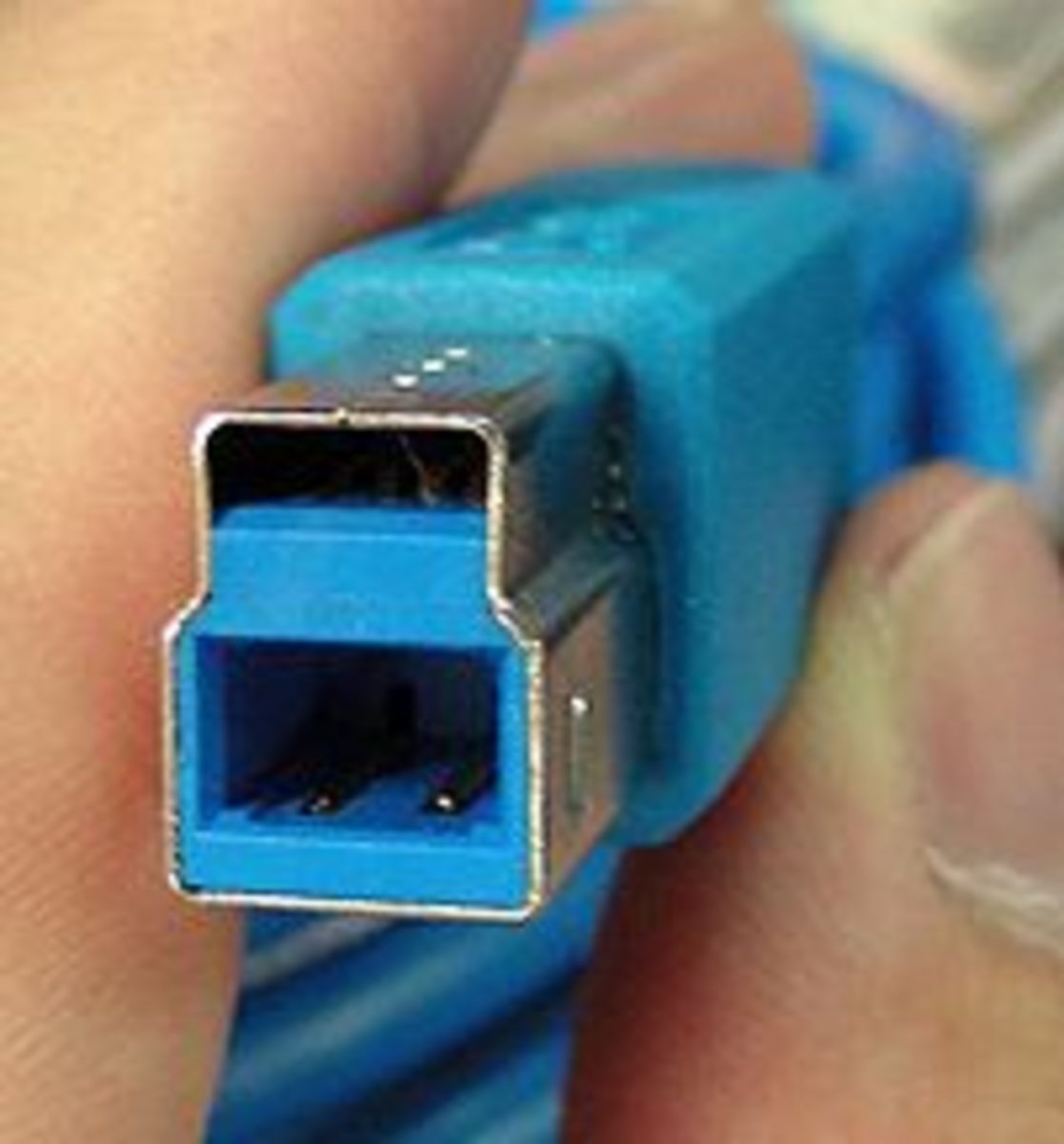 USB 3.0  plug type B for device end of cable.
