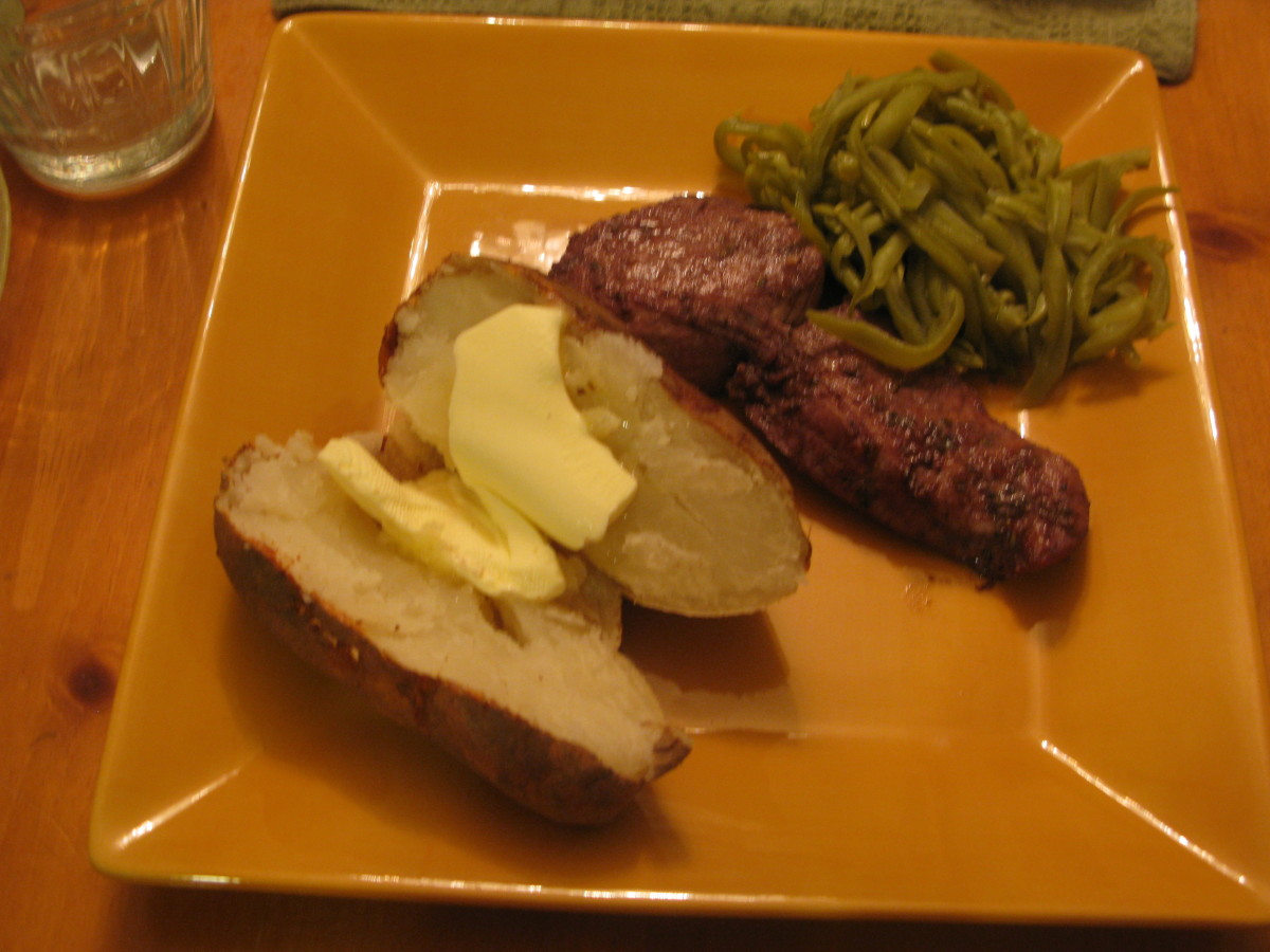 Pork Cutlet in Wine; french cut green beans; baked potato.