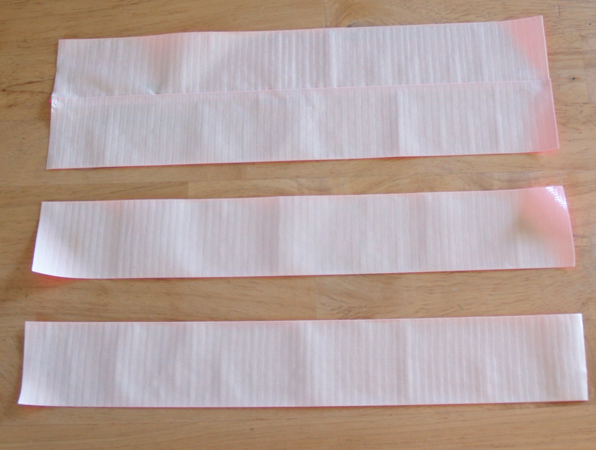 Overlap two of the strips of Duck® Tape.