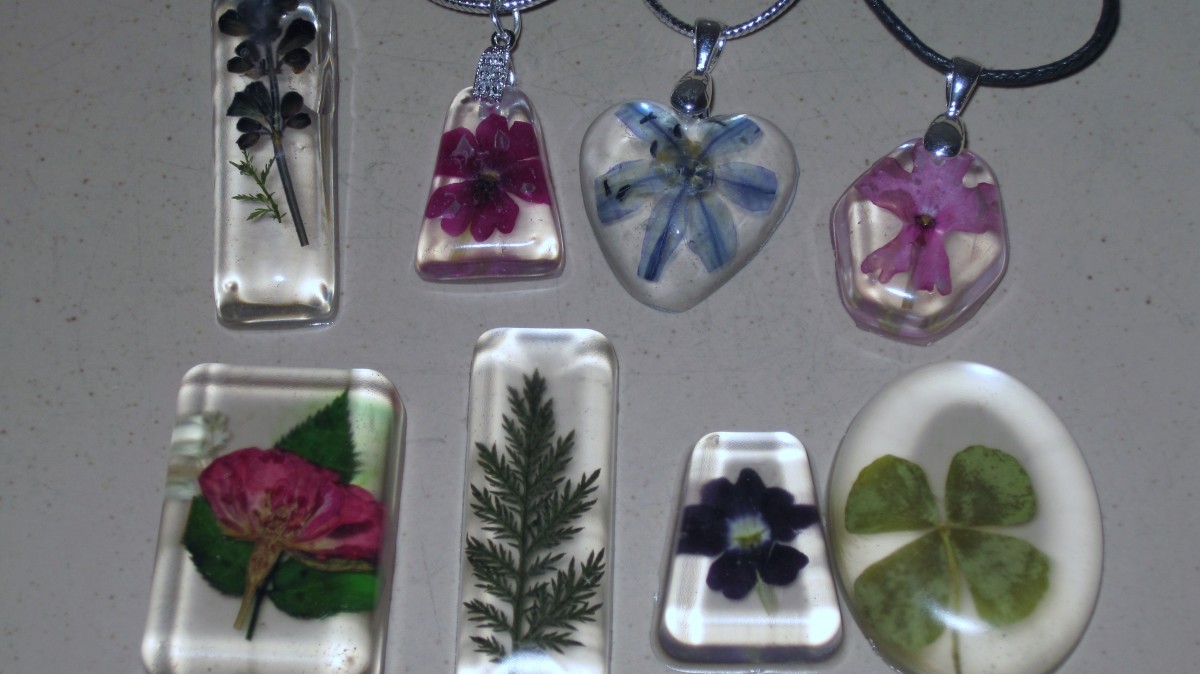 Examples of botanical resin jewelry