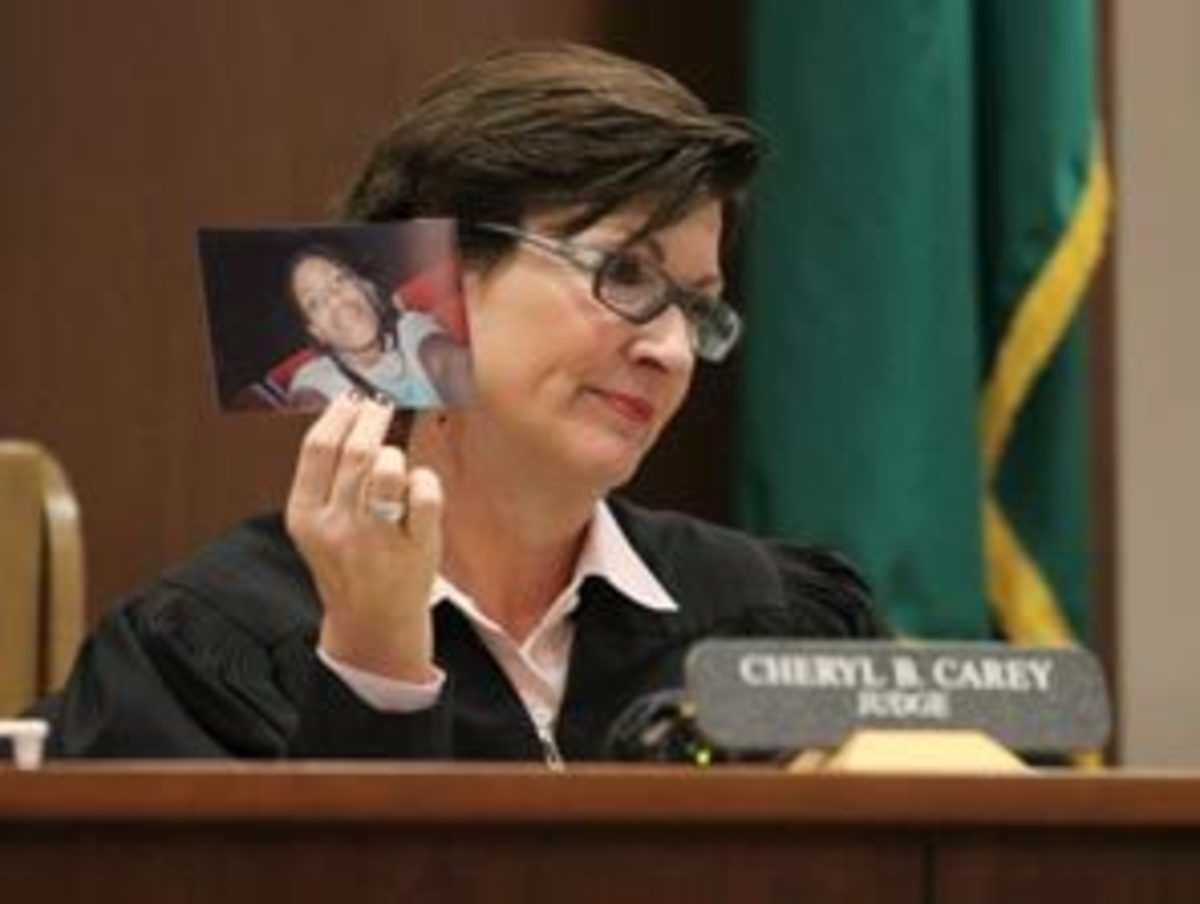 Before sentencing, the judge holds up a picture of the victim