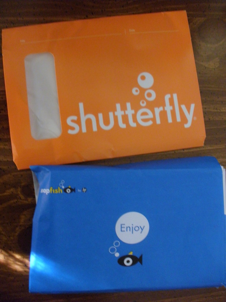 The envelopes for Snapfish and Shutterfly are colorful and have bubbles in their logos.