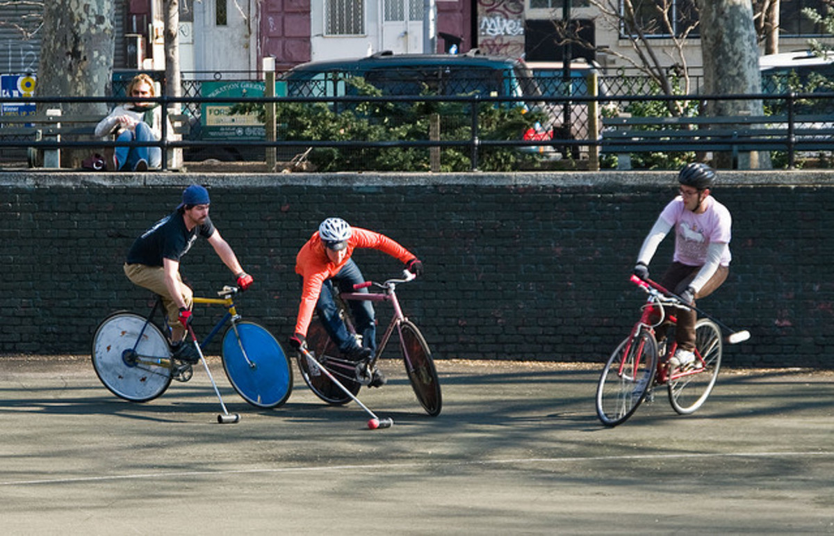 Enthusiast playing bike polo, one of the many activities the fixed wheel makes possible. 