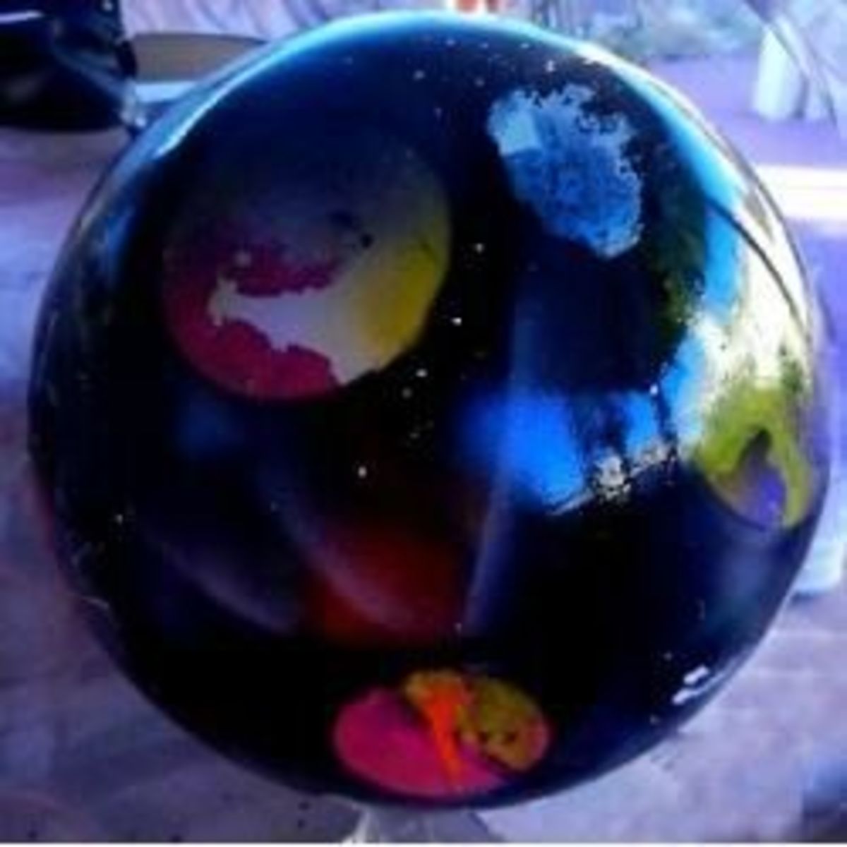 You can see the various sizes of planets I created on this gazing ball.
