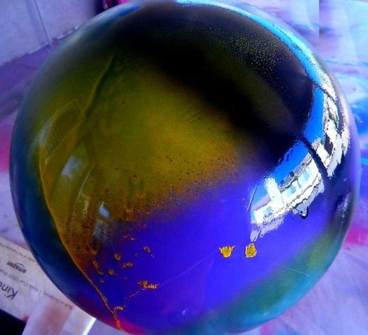 You'll need to apply several layers of paint to the bowling ball.