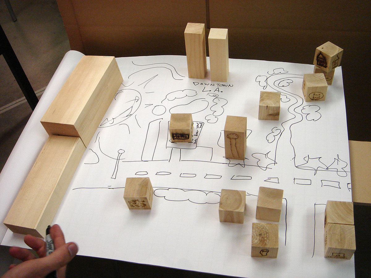 The Map Probe 2, a game for students to model a new downtown for Los Angeles. In this model big blocks are freeways and other blocks are buses.