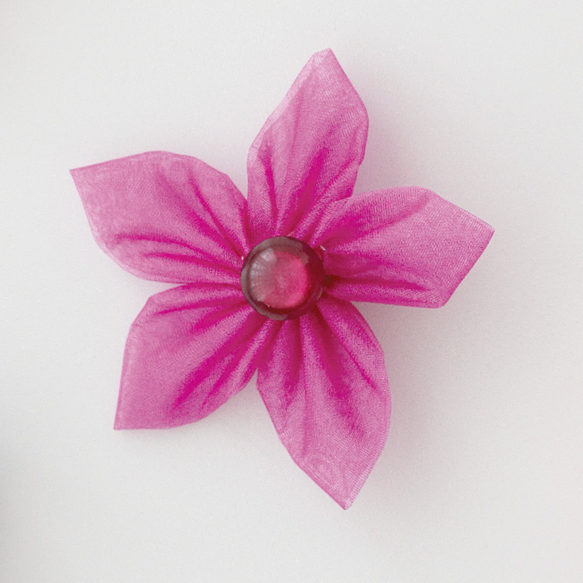 Use a Clover Kanzashi flower maker to create your own embellishments like this one.