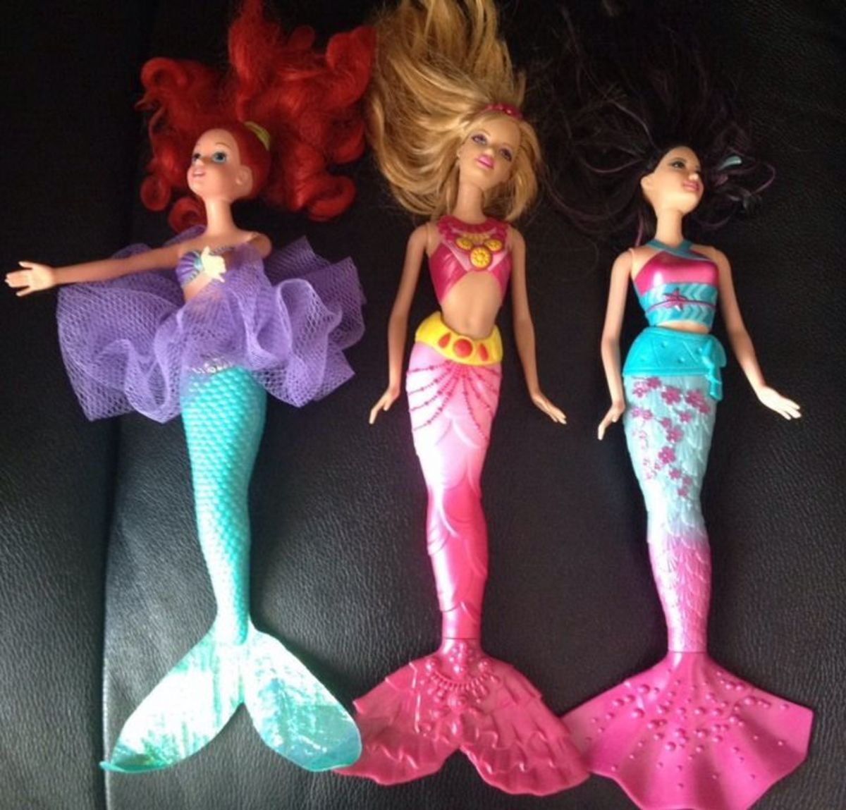 three mermaids