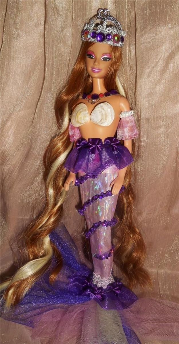 Purple Ooak Barbie Doll full repaint to her face and has been given new adhesive multi-tone hair. her costume is handmade with beautiful detail