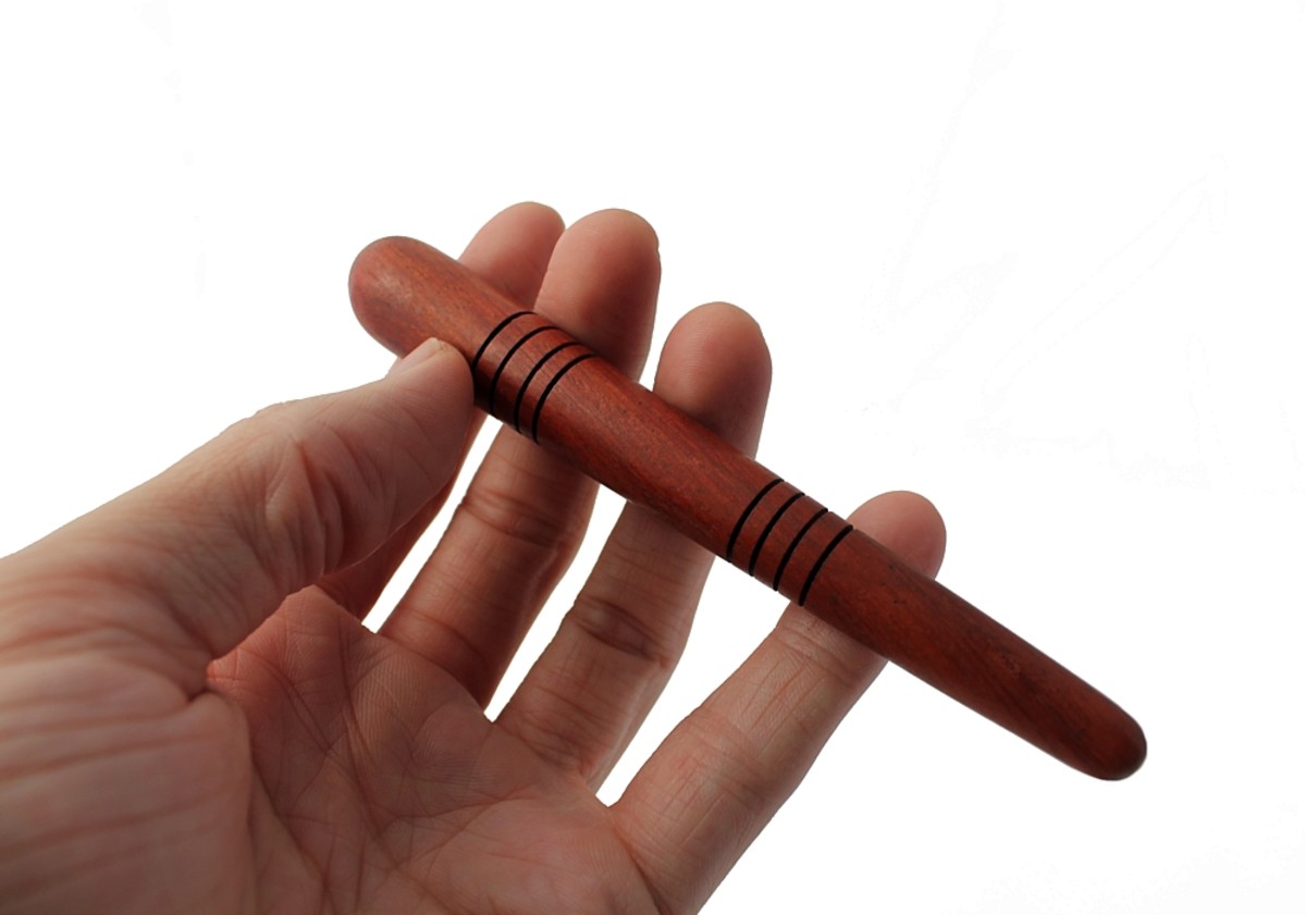Wooden massage sticks help to prevent the thumbs, fingers and hands of the person giving the reflexology to become sore, aching and stiff