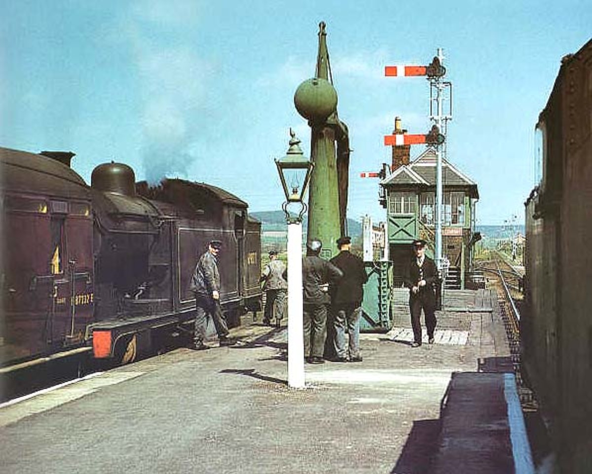 Looking northward in May, 1958 we have two trains crossing at Battersby. The train on the left will leave by way of Great Ayton to Teesside, on the right to Whitby and Scarborough. Both are held by signals