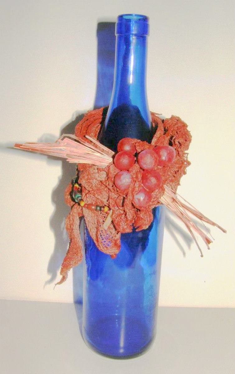 Decorative item for wine bottles created using Paverpol