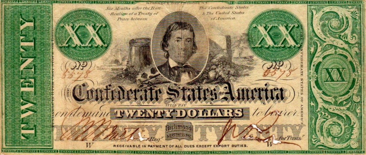 $20.00 CSA Currency. Alexander Stephens, with barrel, cotton bales, etc. in the background. Issued from June 28, 1862 through November 15, 1862. 