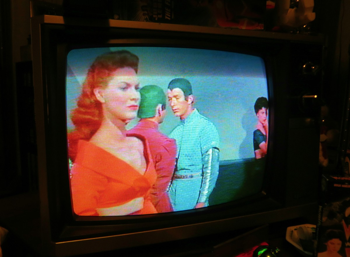 She is 500 years in the Future and wishes she had a Quasar Color Television Model WT59YW, because  "World Without End" looks so good in this television. 