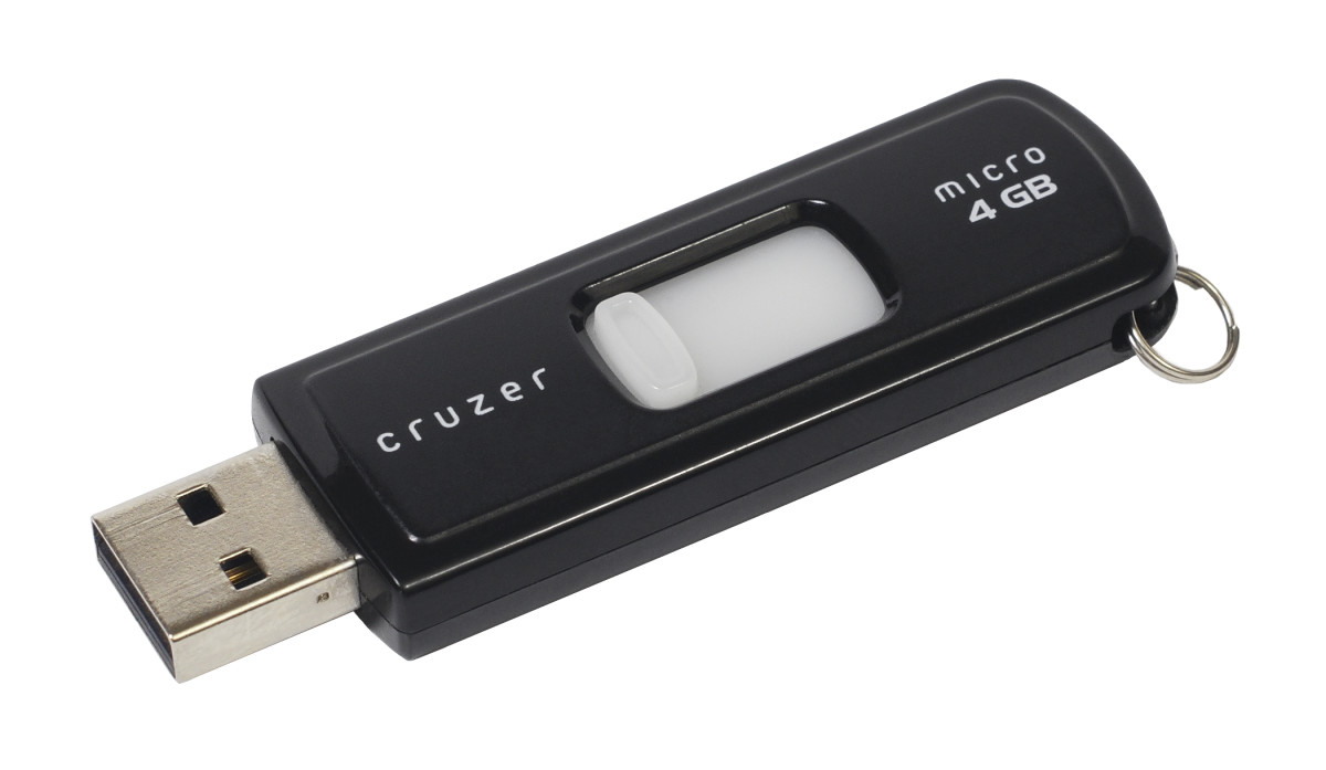 A SanDisk-brand USB thumb drive, SanDisk Cruzer Micro, 4GB.
