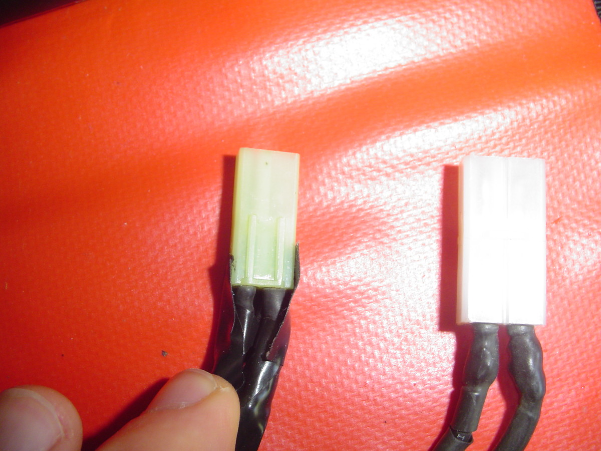 Original connector on the left, Large battery connector on the right