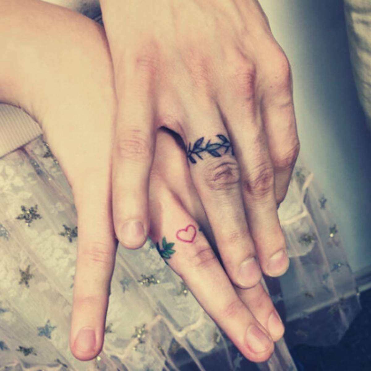 Wedding ring tattoos by @harzatattoo