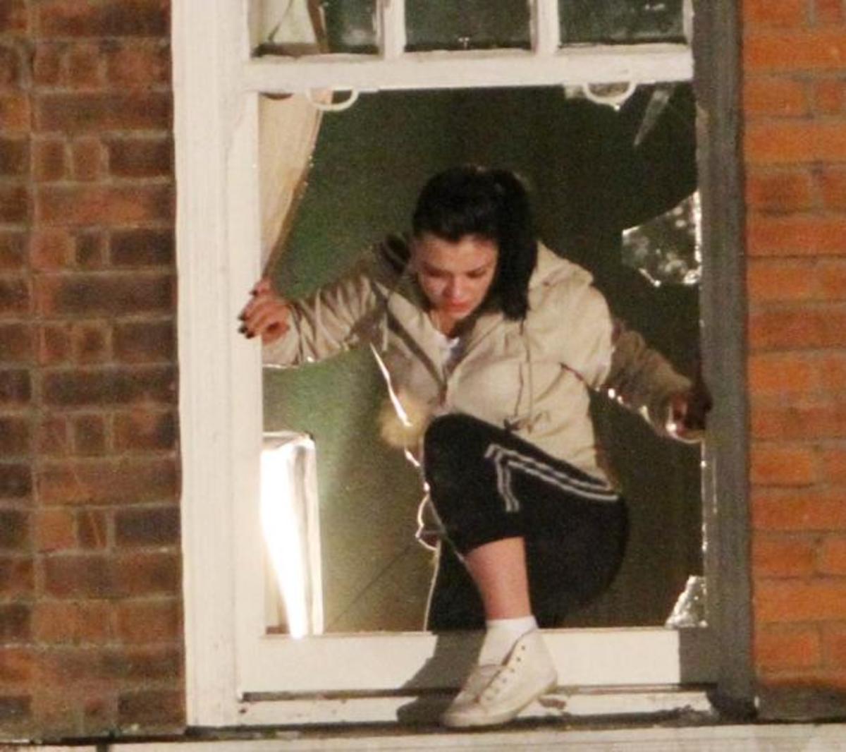 but her only way out is to smash her way through a window and ........