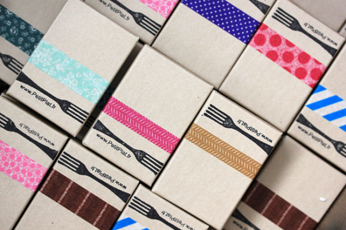 Professional looking packages made with boxes, washi tape and a branded stamp.