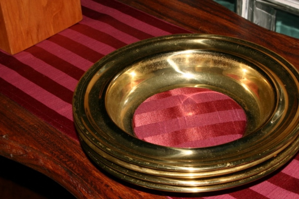 The collection plate is passed during the worship service.
