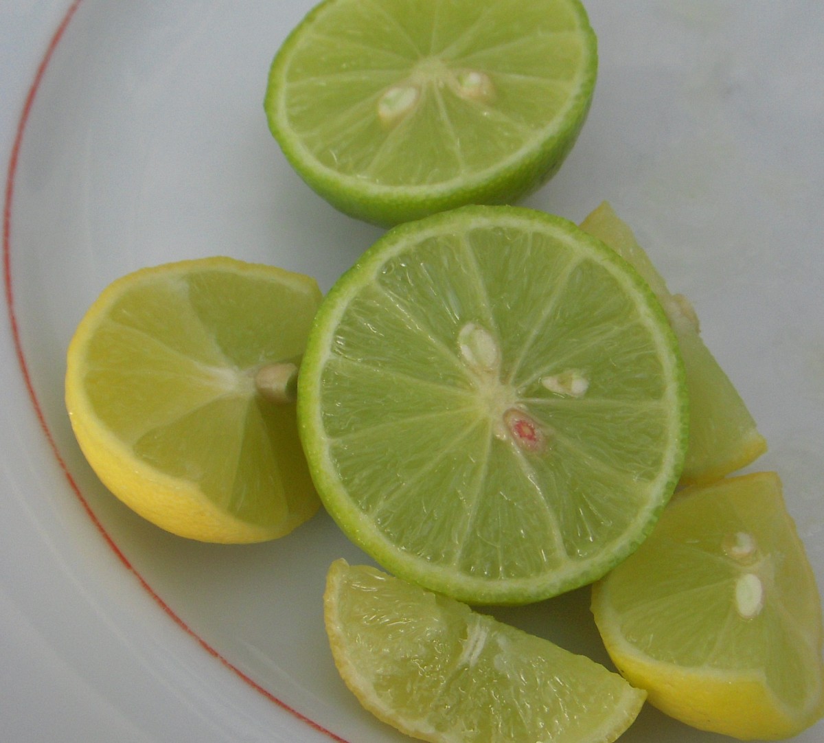 Key lime fruit has a yellow skin when ripe. The fruit is smaller than a regular lime, and seedy.