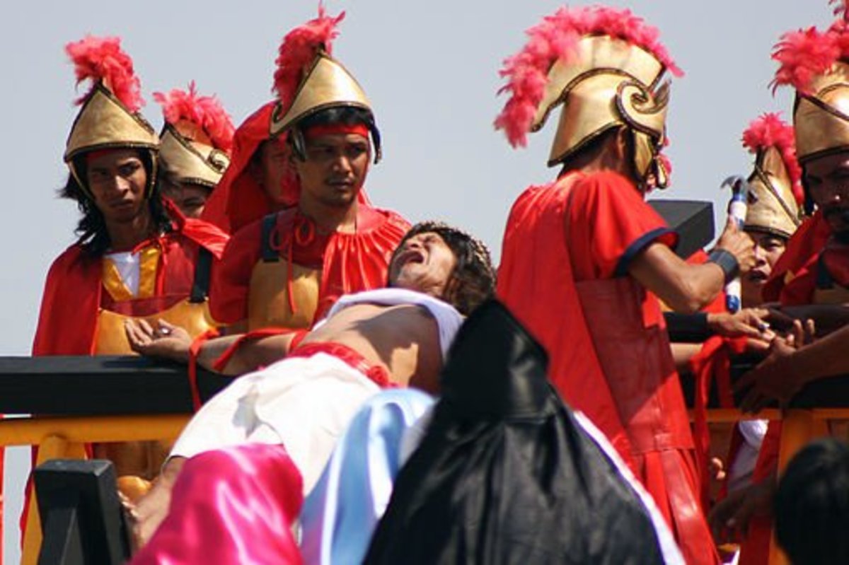 Nail being driven to the devotee's palm in this re-enactment of crucifixion of Christ 