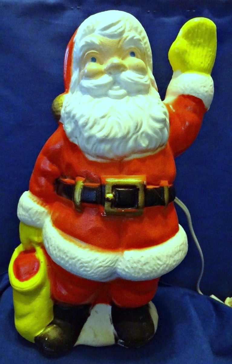  The happy little Santa Claus with the bright yellow glove and matching yellow bag was made in the Late 1960s. He has very soft soulful blue eyes ...