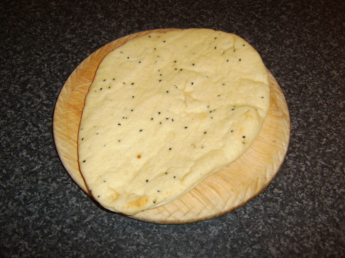 A supermarket naan of 10 to 12" will make two Indian burgers of this type