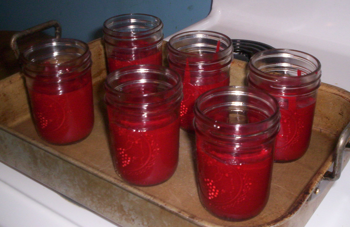 The filled jars are placed in the oven to cook the cake in a jar.