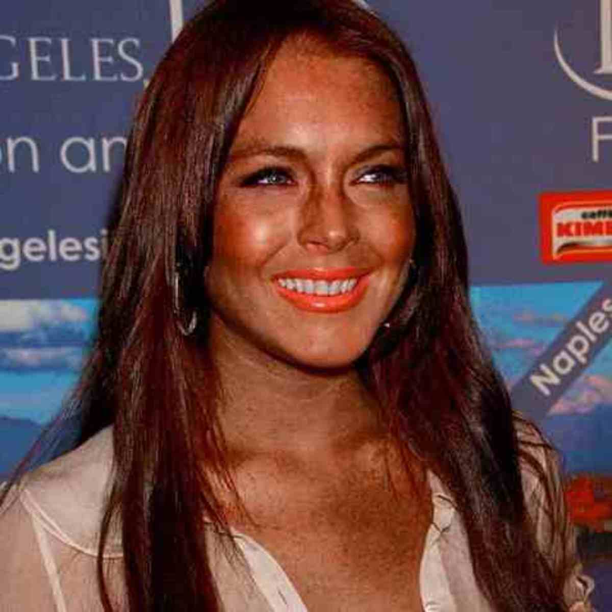 Lindsay Lohan's orange/brown face.  It reminds me of an old oak table.  is she a chip of the old block?!