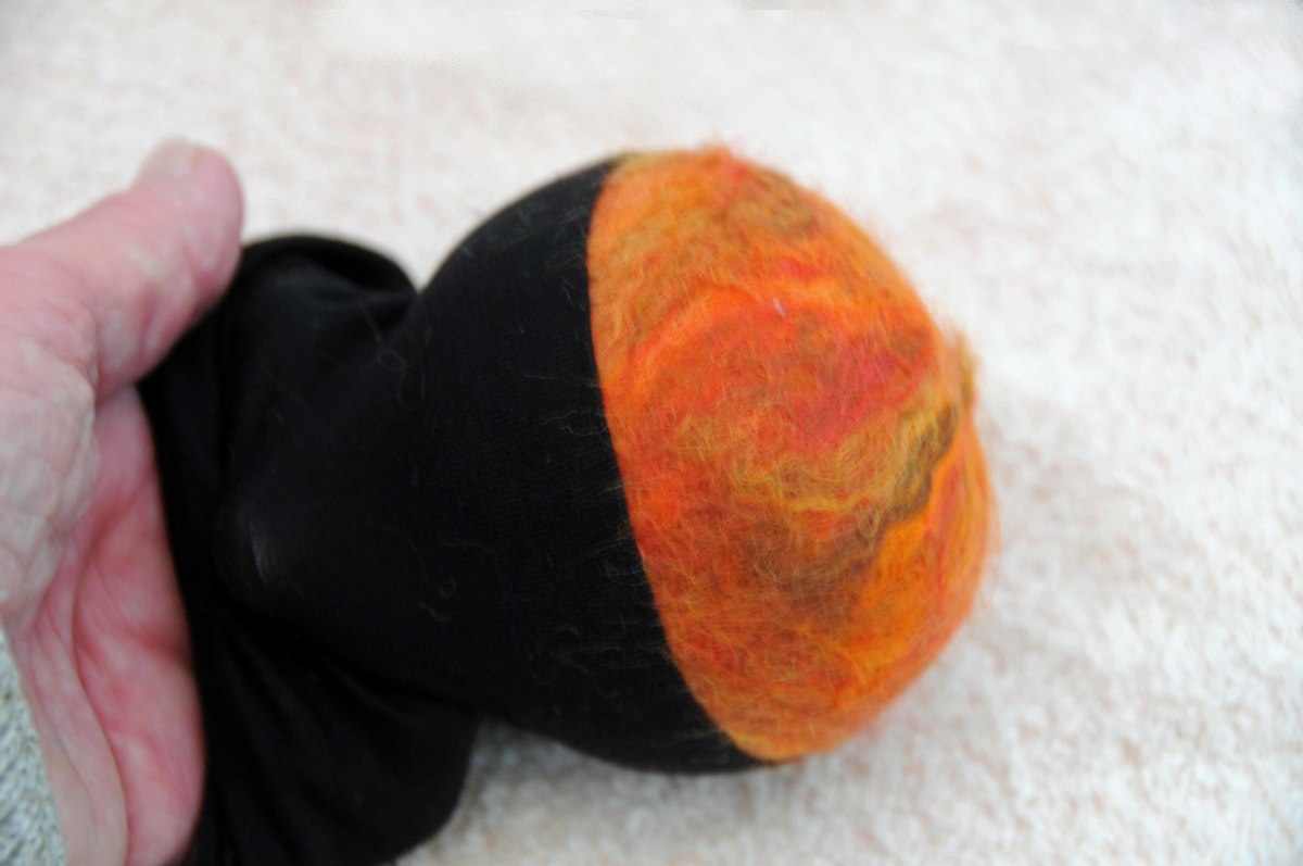 Remove the tights once the wool has felted.