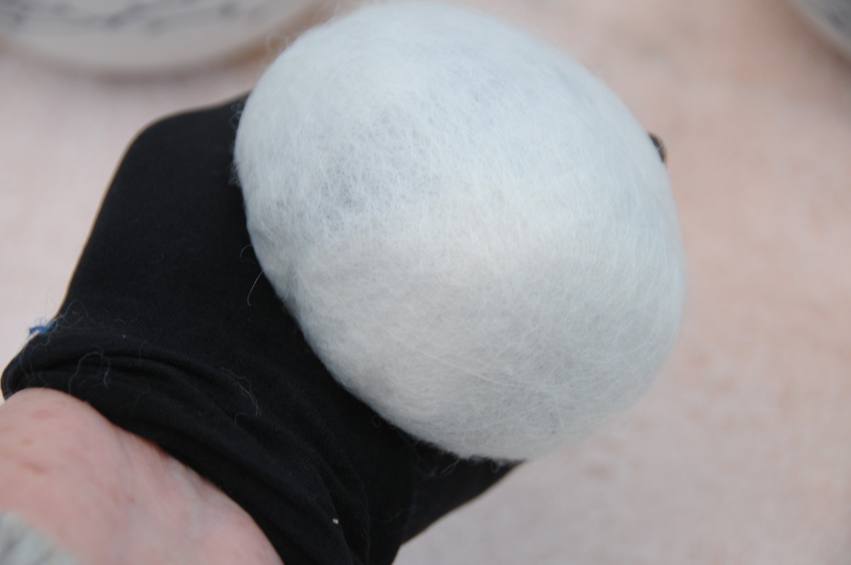 Put the ball into a leg of a pair of cut-off stockings or tights.