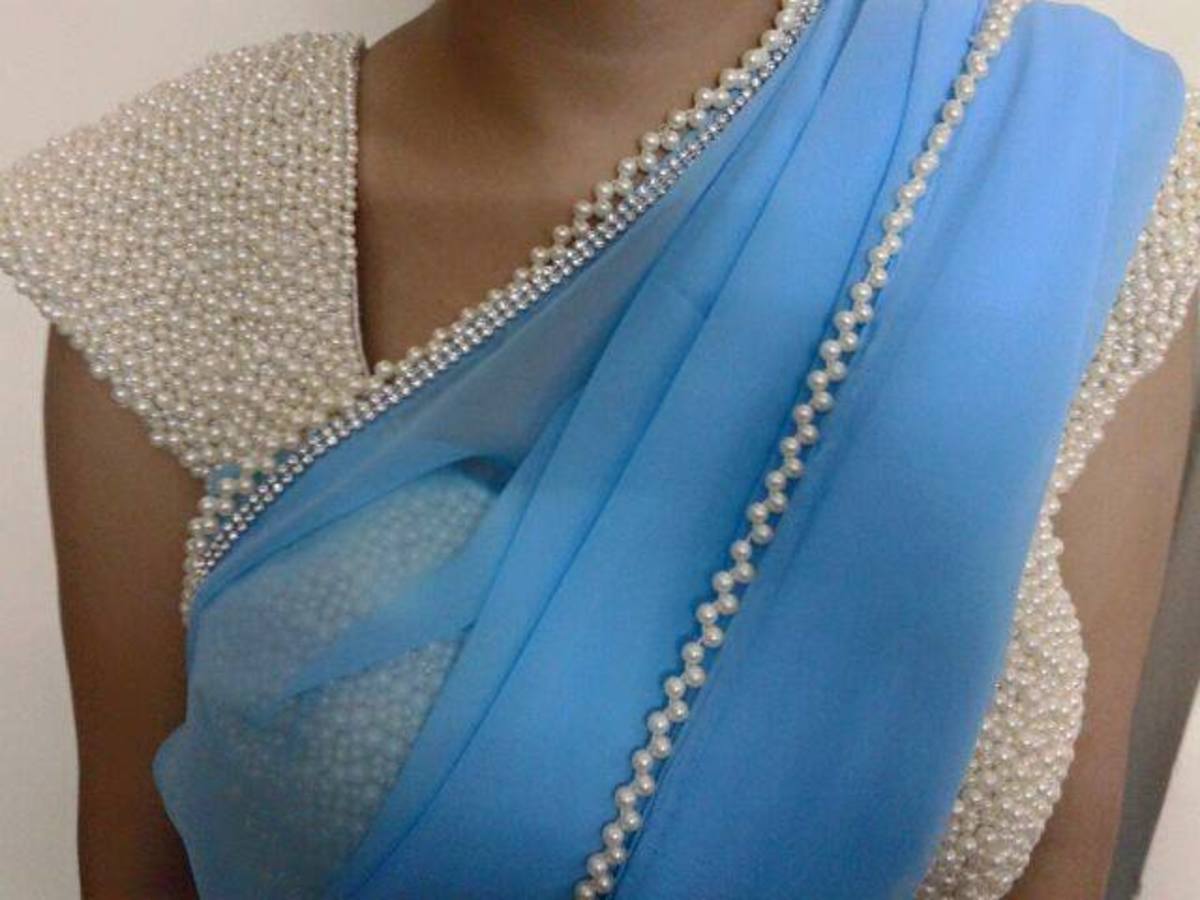 short sleeve full coverage pearl designed blouse with sky blue chiffon saree