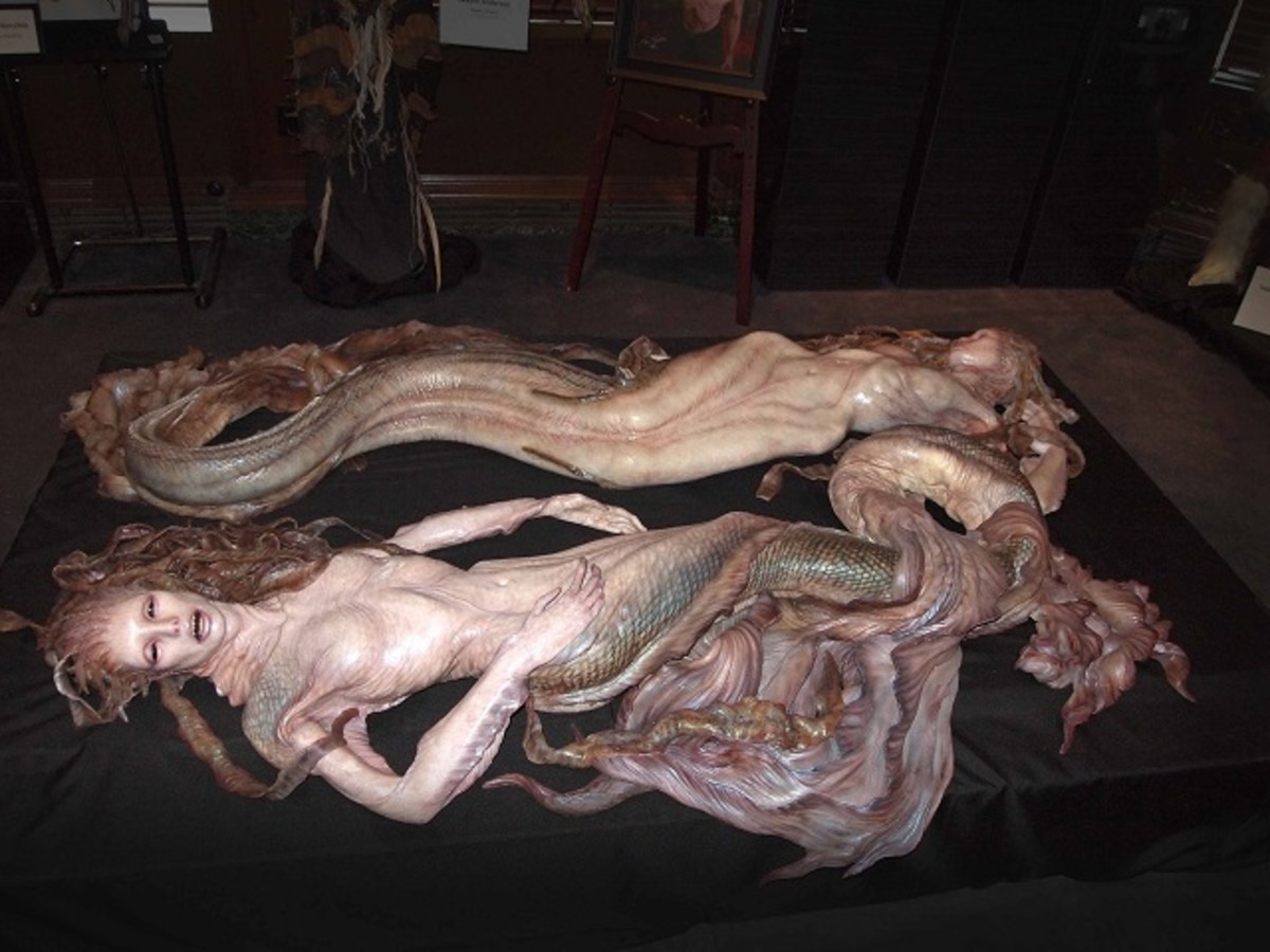 A dead mermaid sculpture that was first found on the beach.
