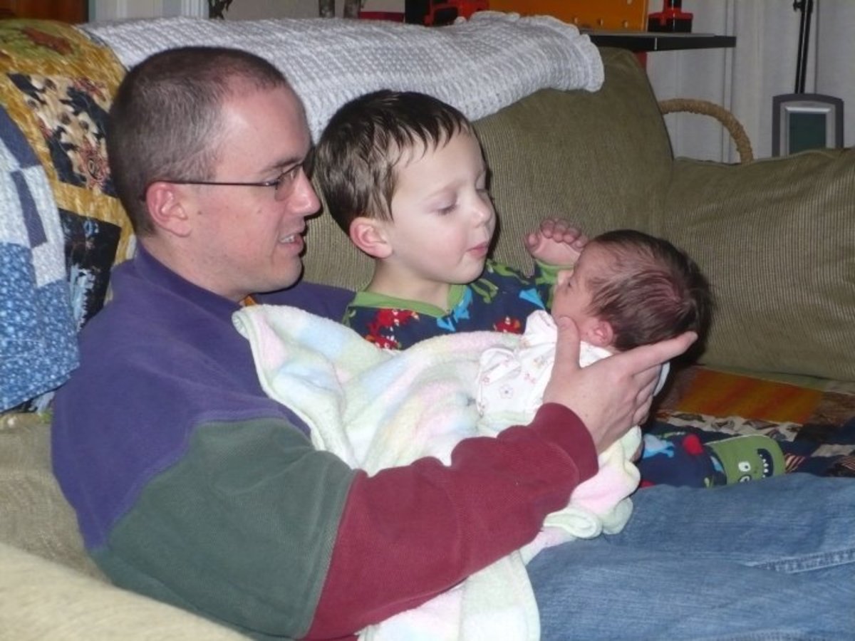 My husband, son (Joel) and daughter (Erin) a few weeks after Erin was born.