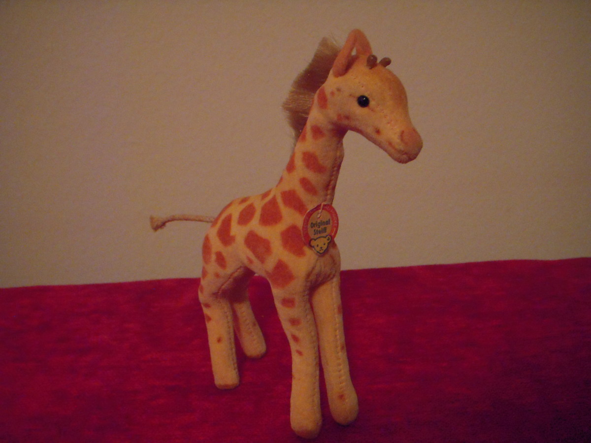 Even the slim-legged giraffe stands upright and steady.  Its spots are well-placed and seams are tight and smooth, barely noticeable even though the material is a smooth cotton velvet.