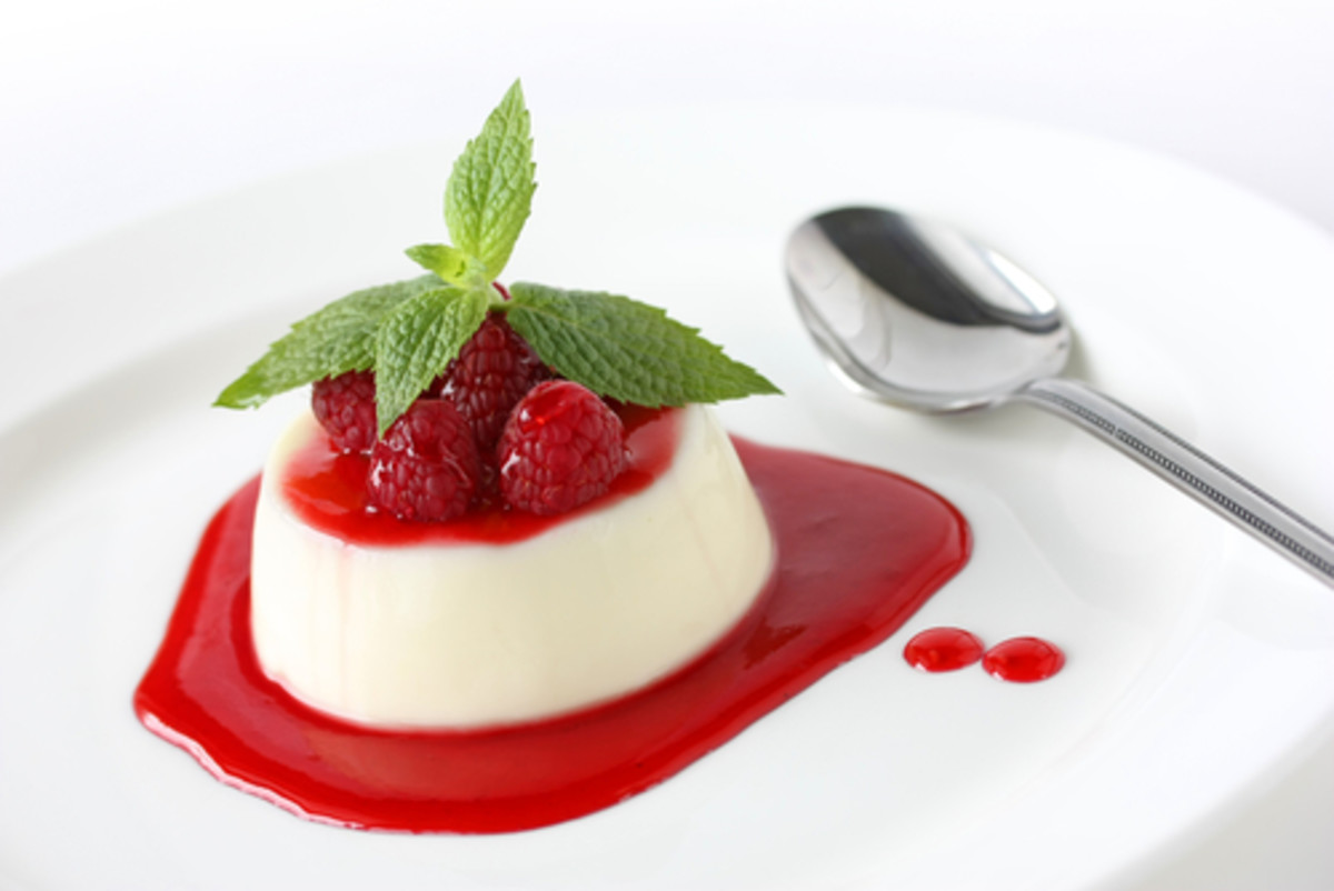 Panna Cotta with raspberry coulis. Image:  bonchan|Shutterstock.com