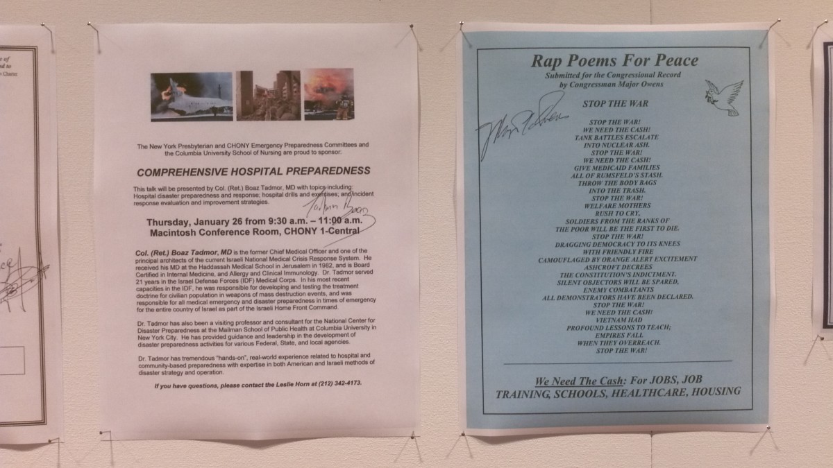 Item left documents an important gathering addressing hospital emergency preparedness. Next to it is a signed pamphlet of rap poems from former NY Representative Major Owens.