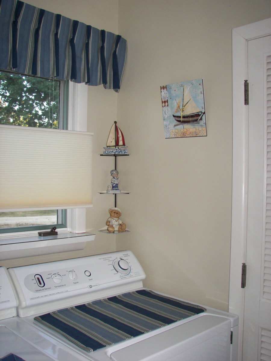 Nautical Laundry Room with Blue Stripes and Sailboats
