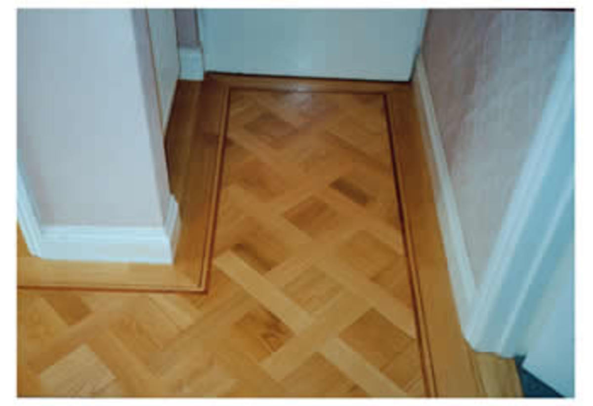 Decorative wood floor with border design - dark wood inlay