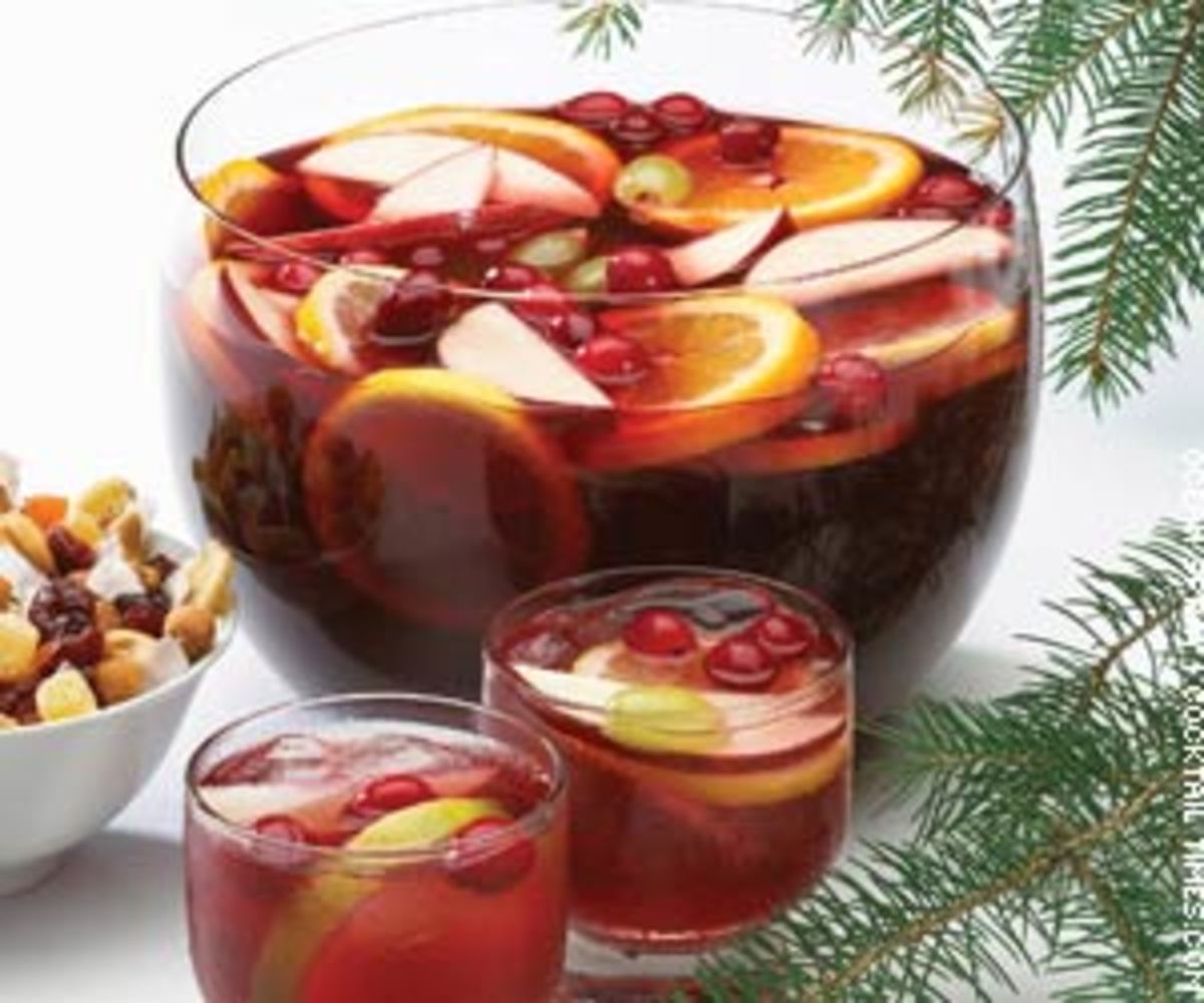 Adding apples and cranberries to the punchbowl makes it look even more festive.