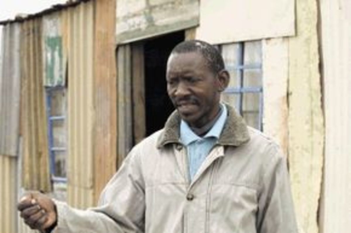 Mr. Ntlantla Vilakazi who has is being forded off his land for a fee of R20,000 AND AN RDP HOUSE