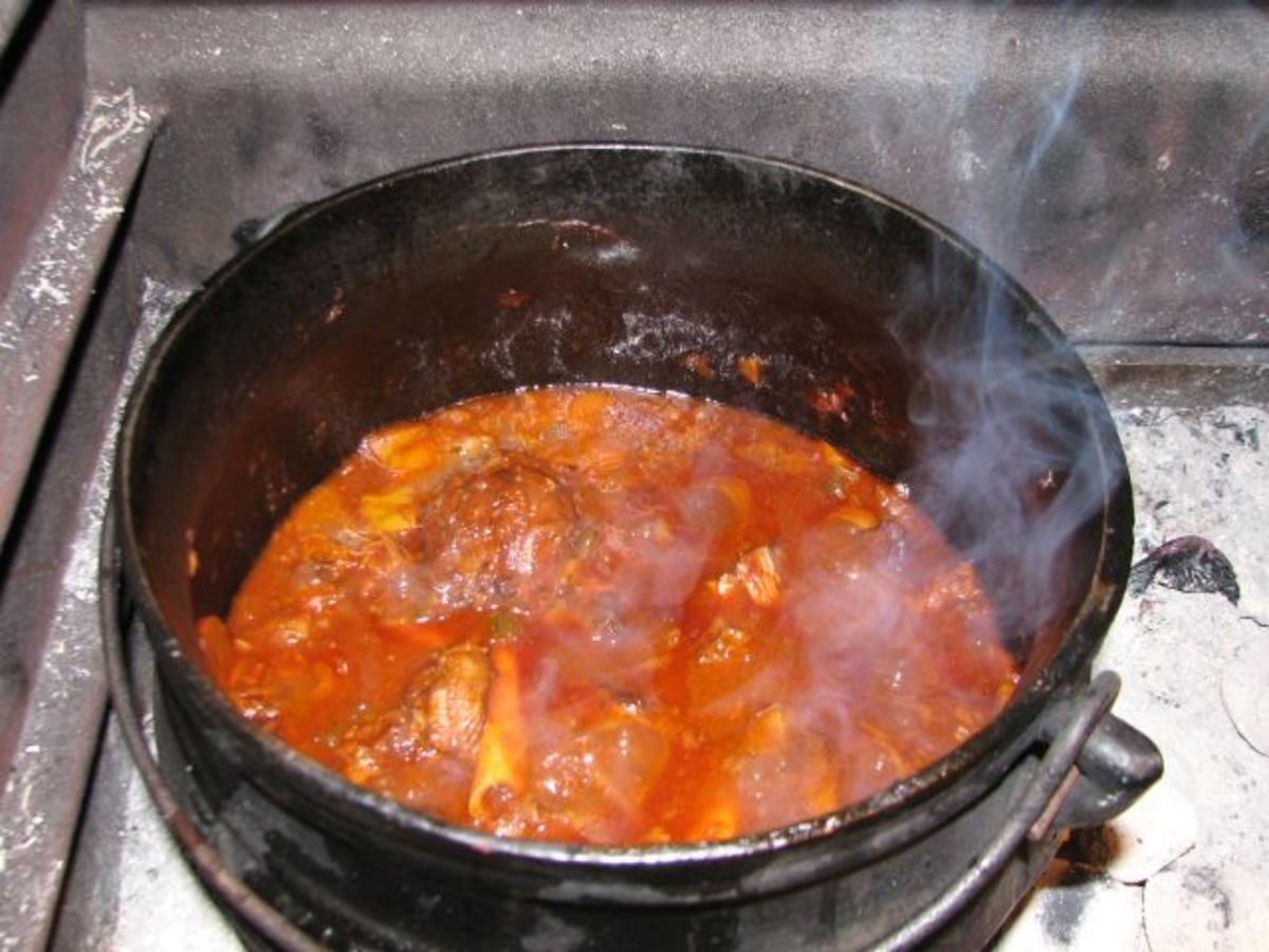 The final stage: Simmering & Reducing the Sauce with the lid off