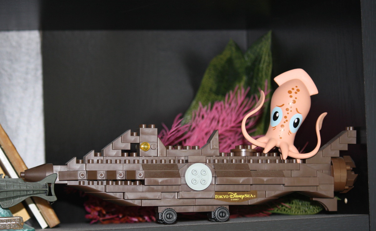 In this dramatic tableau, Vinylmation giant squid attacks toy brick Nautilus purchased at Tokyo Disney Sea.